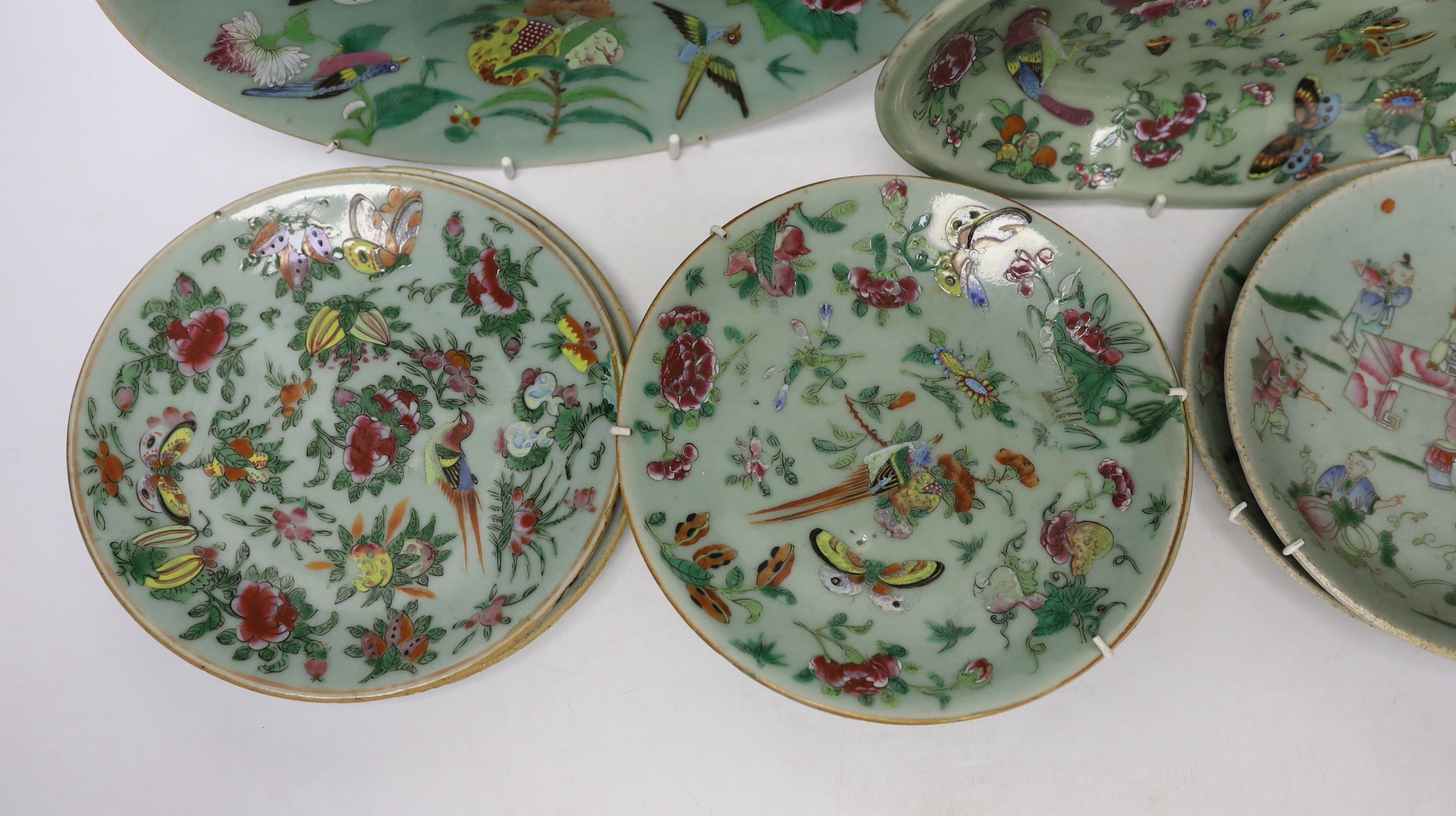 Eight 19th century Chinese celadon glazed famille rose dishes, largest 26cm